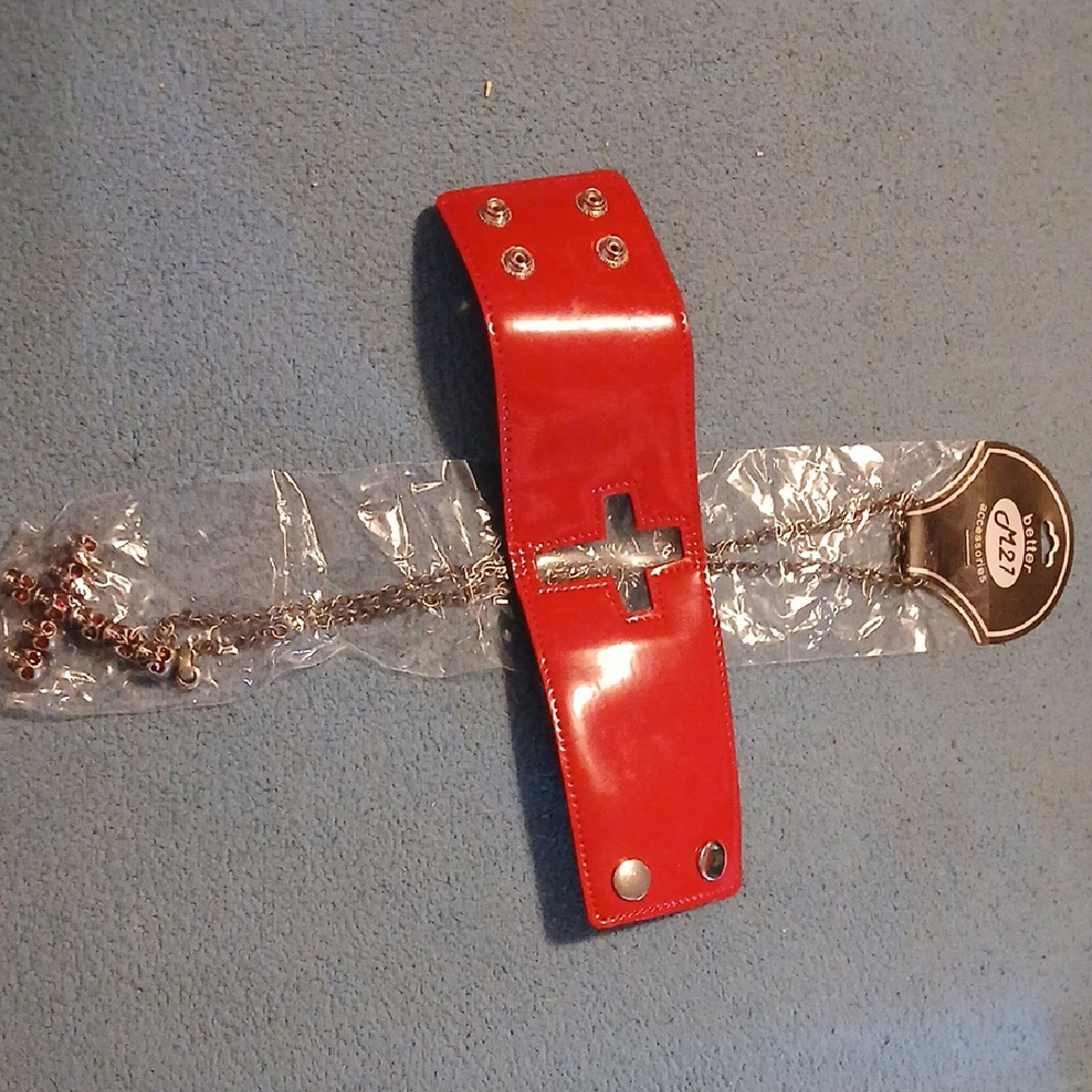 Red Cuff Bracelet And Skull Cross Chain